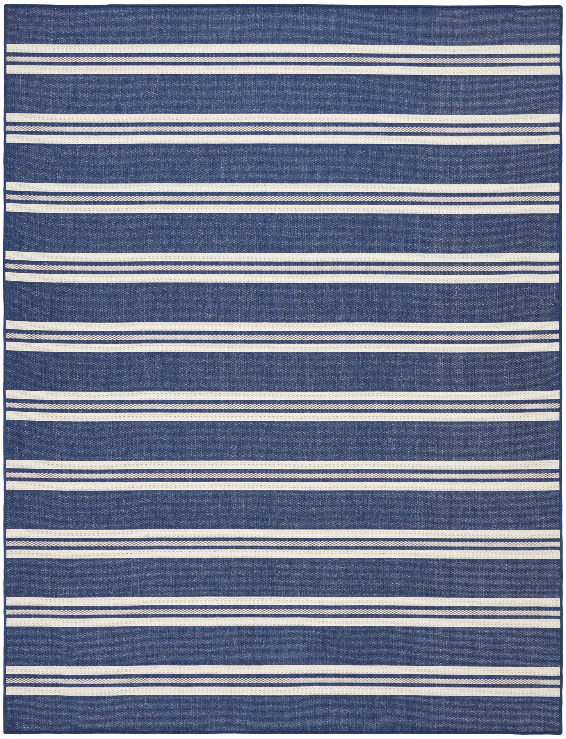 Navy blue rectangular rug with evenly spaced white horizontal stripes in a nautical casual style.