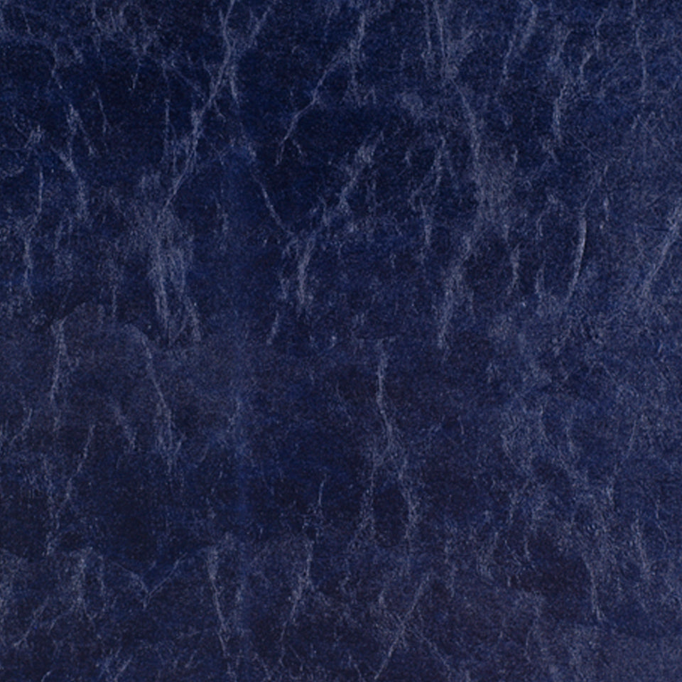 Dark blue upholstery fabric with a marble-inspired pattern and light blue veins