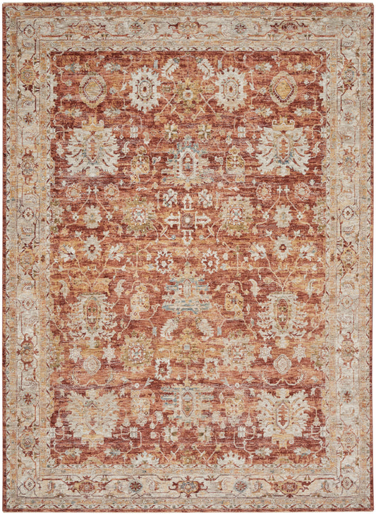 Rectangular rug: rust-red field with ivory border, distressed floral medallions in cream, beige and pale blue.