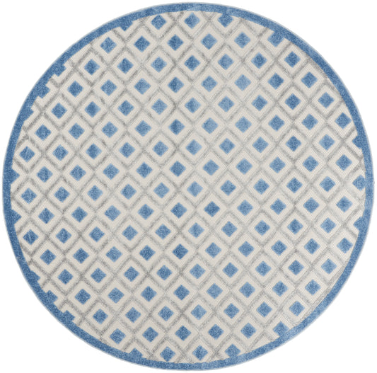 Round rug with light gray background and blue diamond lattice pattern, blue border.
