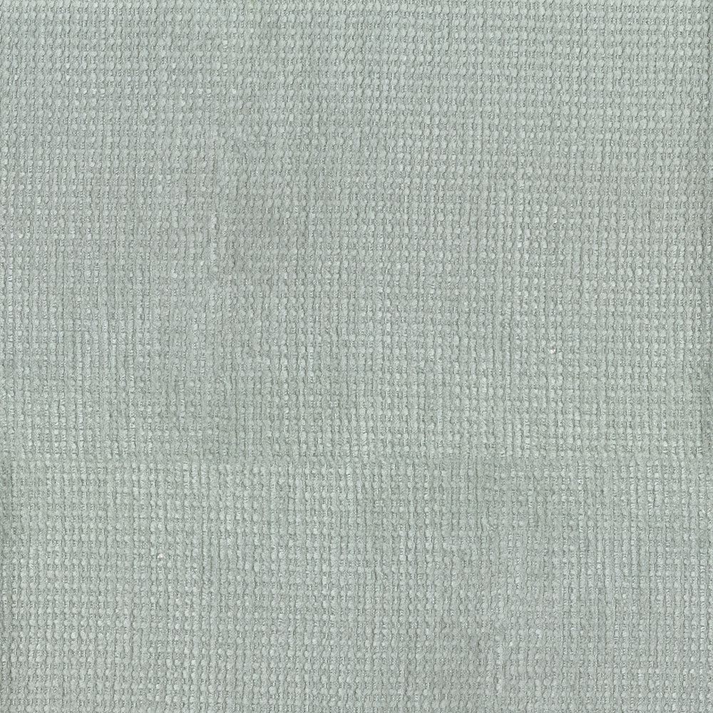 Light gray textured fabric with small raised loops and subtle grid pattern, upholstery or drapery material.