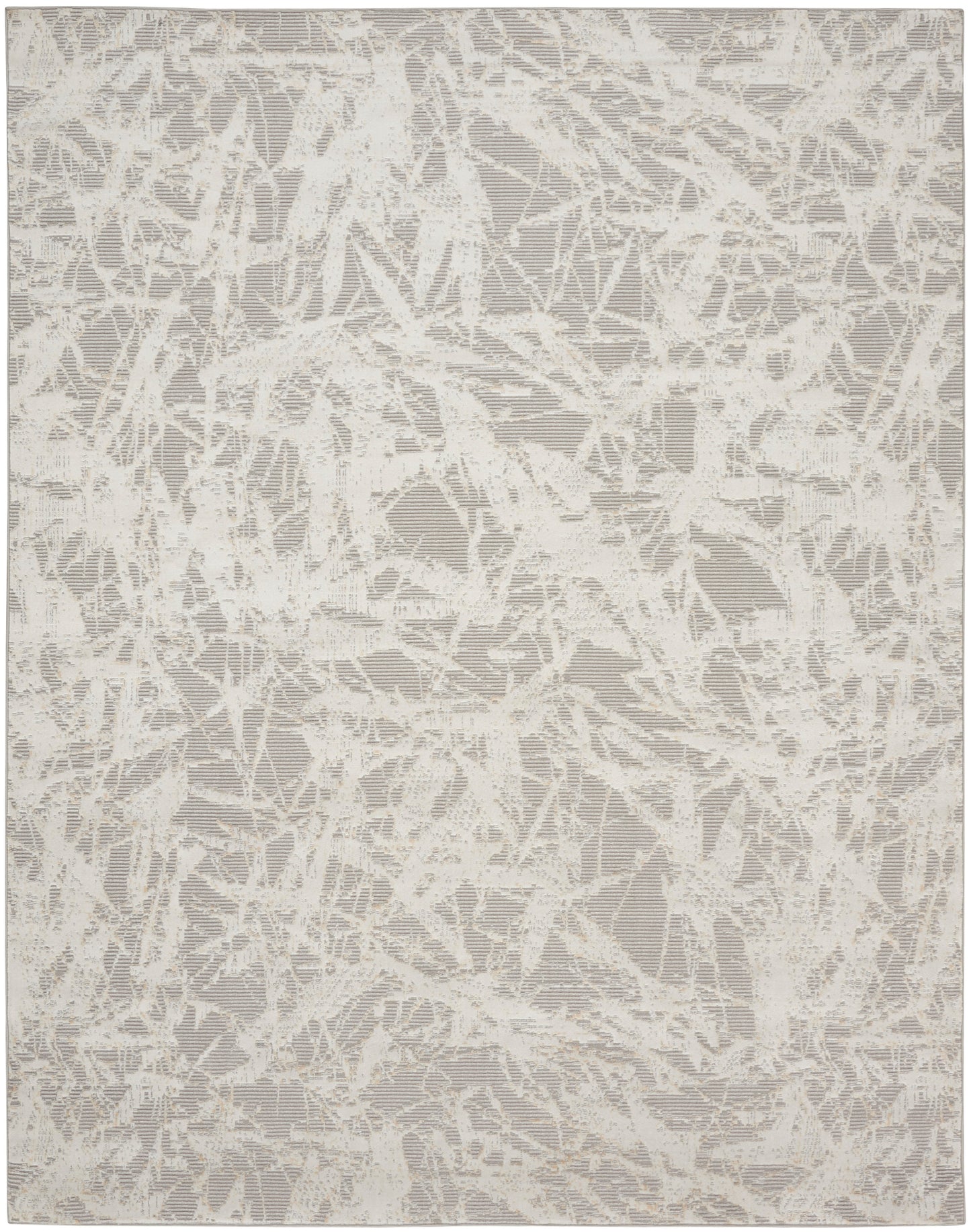 Neutral cream and taupe abstract rug with a shattered, lace-like pattern.