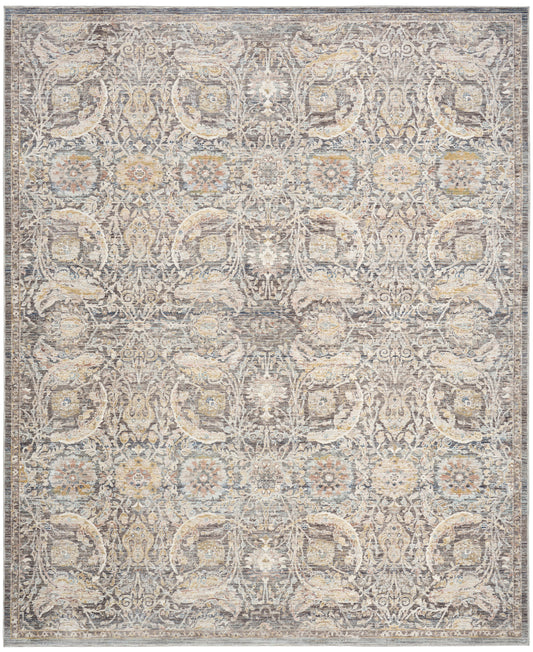 Rectangular vintage-style oriental rug in distressed beige-gray with intricate floral damask pattern and blue-tan accents