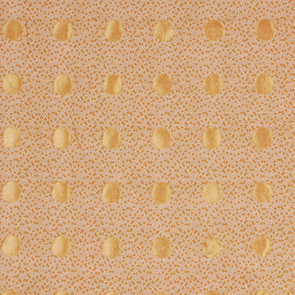 Wheat textured fabric with evenly spaced beige polka dots on a fine speckled background.