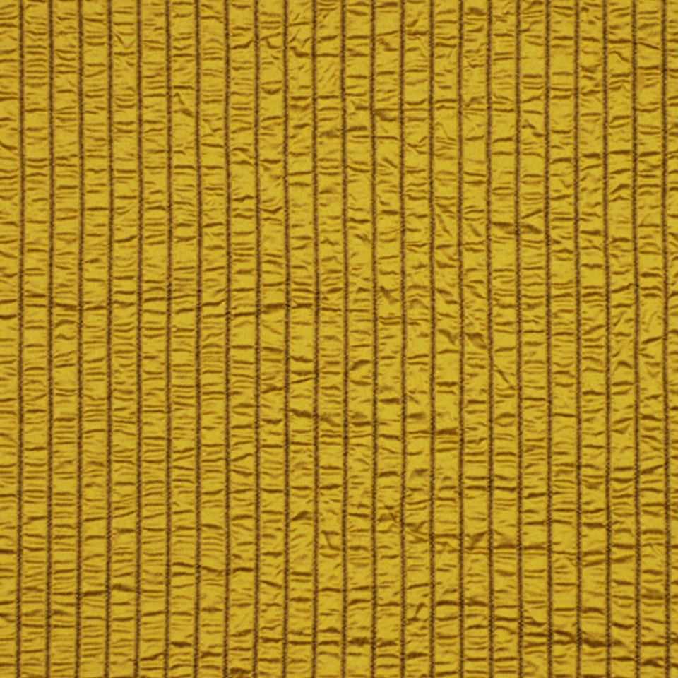 Mustard yellow corduroy-like fabric with vertical ridges; close-up textile texture.