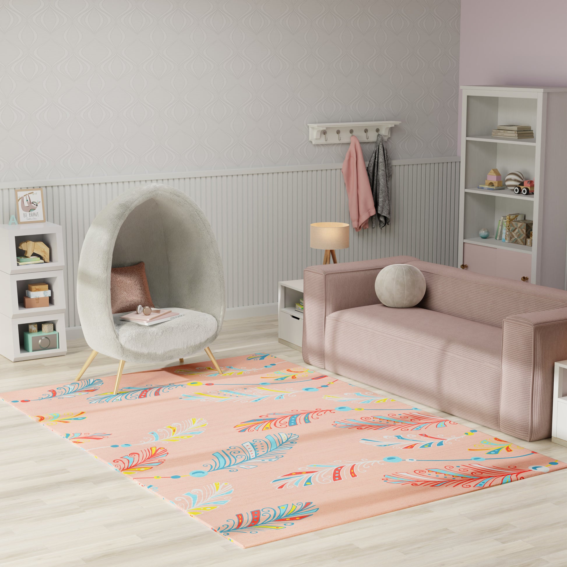 Pastel kids' living room: peach feather-pattern rug, pink sofa, gray egg pod chair, white shelves.
