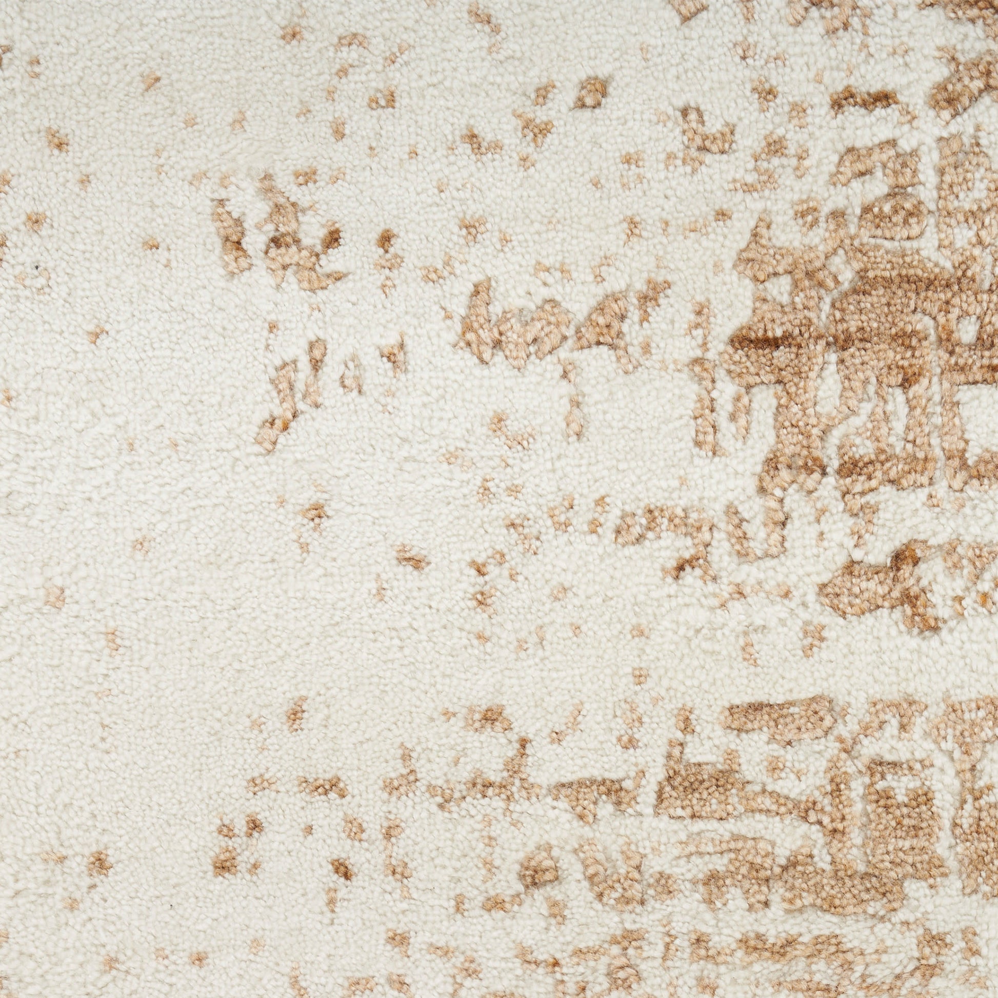 Beige textured rug with a rust-brown abstract pattern in a modern style.