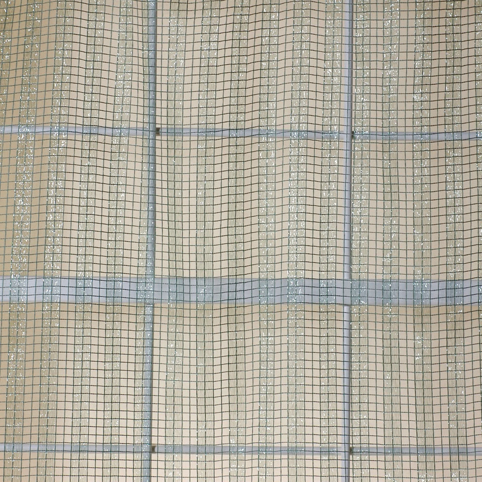Beige woven fabric with light blue grid pattern, close-up texture, plaid-style material suitable for upholstery or curtains.
