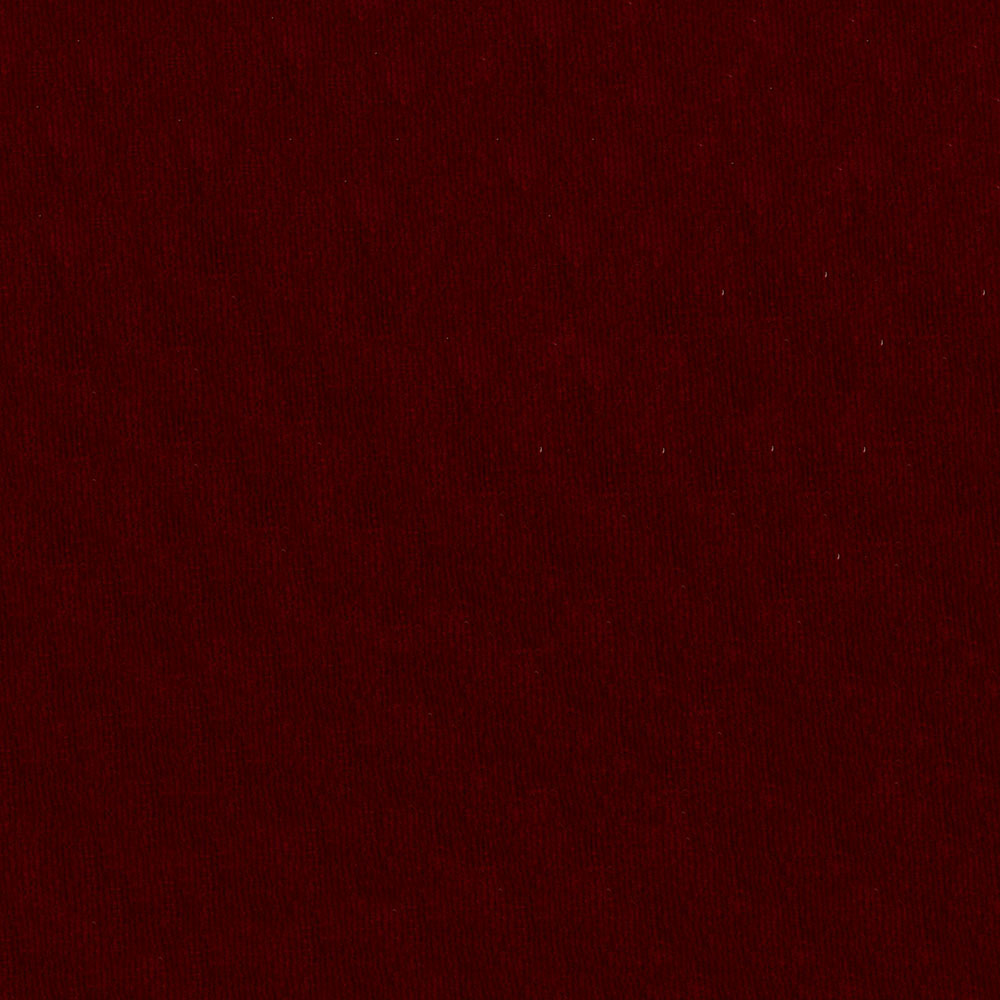 Deep burgundy velvet fabric close-up with soft nap and subtle sheen.