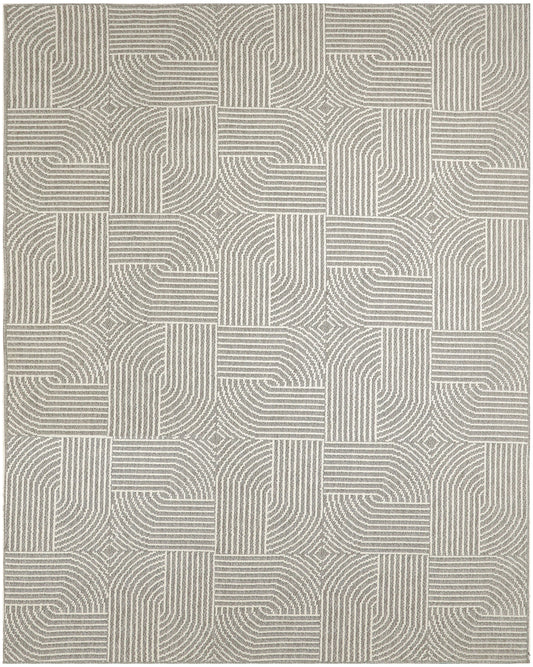 Beige and taupe area rug with repeating square blocks of curved striped lines, geometric modern style.