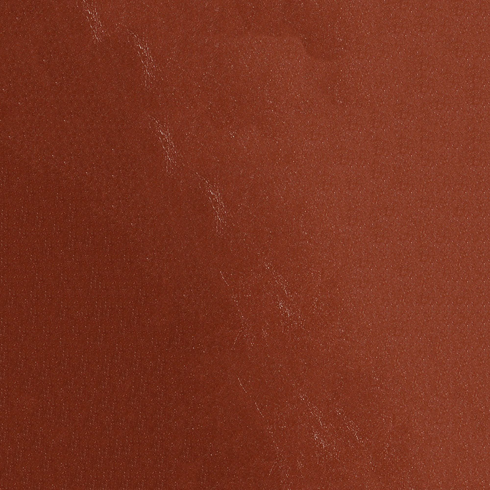 Close-up of orange distressed fabric with a rustic, textured weave.