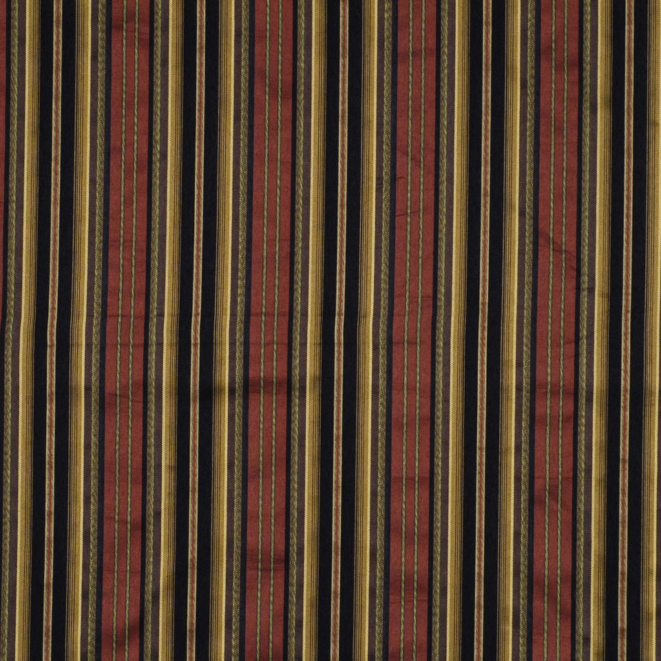 Vertical striped fabric in maroon, black and gold with thin gold accents; upholstery textile.