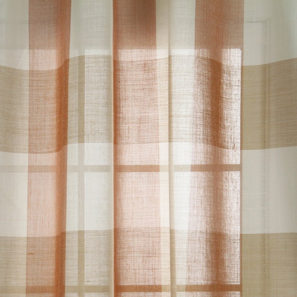Sheer plaid curtain in warm beige and peach tones, linen-like fabric with a soft grid pattern.
