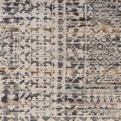 Rectangular rug with distressed abstract pattern in cream, gray, navy and tan; vintage-inspired, soft plush pile.