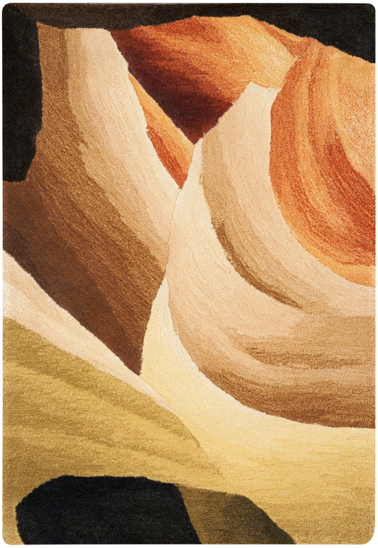 Abstract canyon rug in warm earth tones with flowing beige, cream, rust and black shapes.