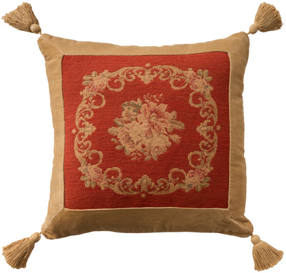Decorative square throw pillow with red center panel, beige floral medallion, tan border, & tassels at all four corners.