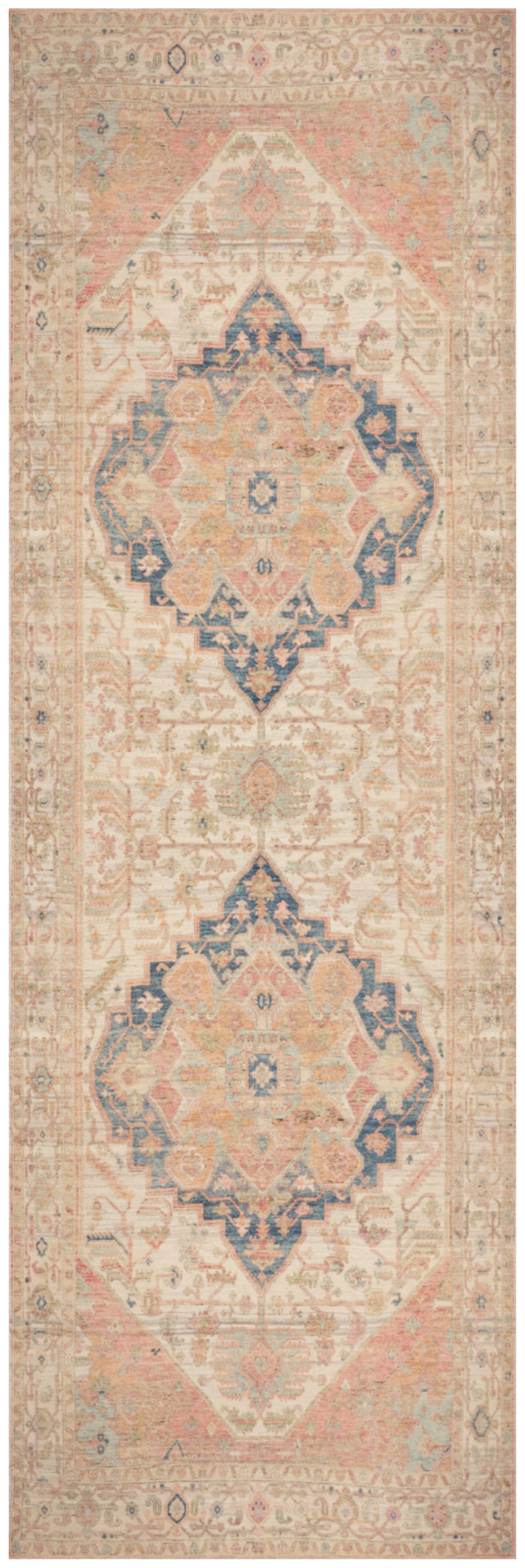 Oriental-style runner rug in beige with pink-peach diamond medallions and navy blue accents, vintage distressed look.