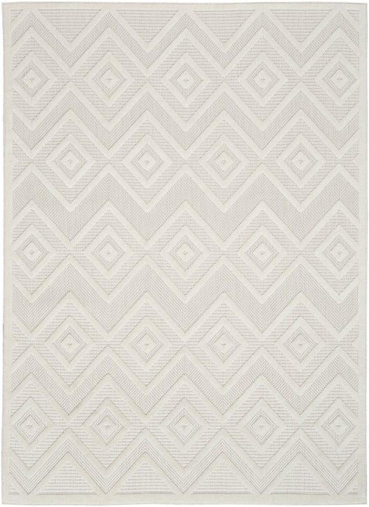 Ivory geometric diamond rug with textured raised pattern; modern woven area rug for living room.