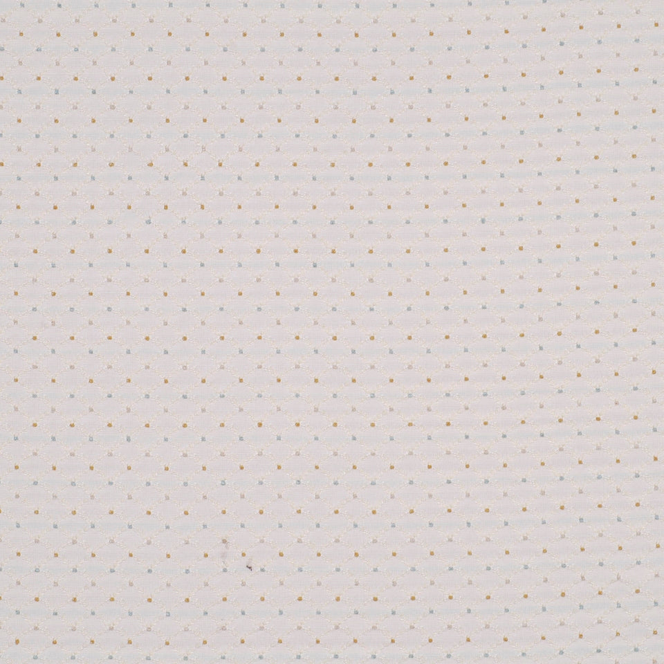 Beige fabric with tiny gold dots in a subtle dotted pattern; soft textile for upholstery or apparel.