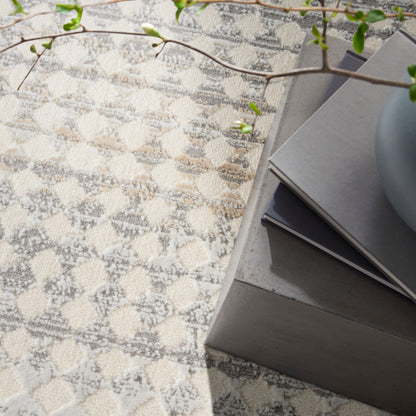 C K Design CK950 Rush 5ƒ?? x 7ƒ?? Ivory/Multi area rug from Primoends by Nourison with geometric abstract pattern, textured high-low pile, machine-made polypropylene/polyester indoor rug for living room or bedroom d??cor.