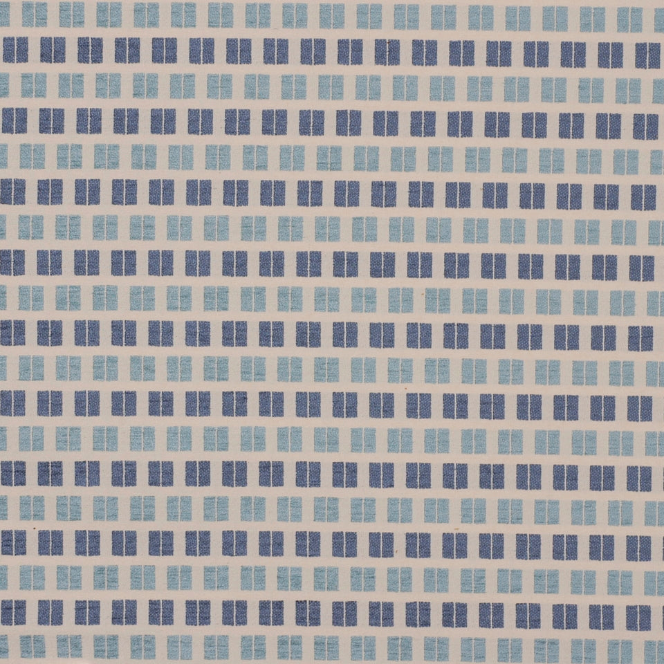 Geometric grid of tiny blue squares in light to navy tones; tile-like pattern for upholstery fabric.