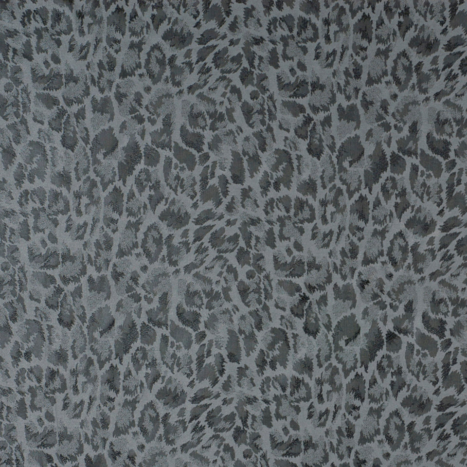 Grey leopard-print fabric texture with soft, fuzzy spots in dark and light gray.