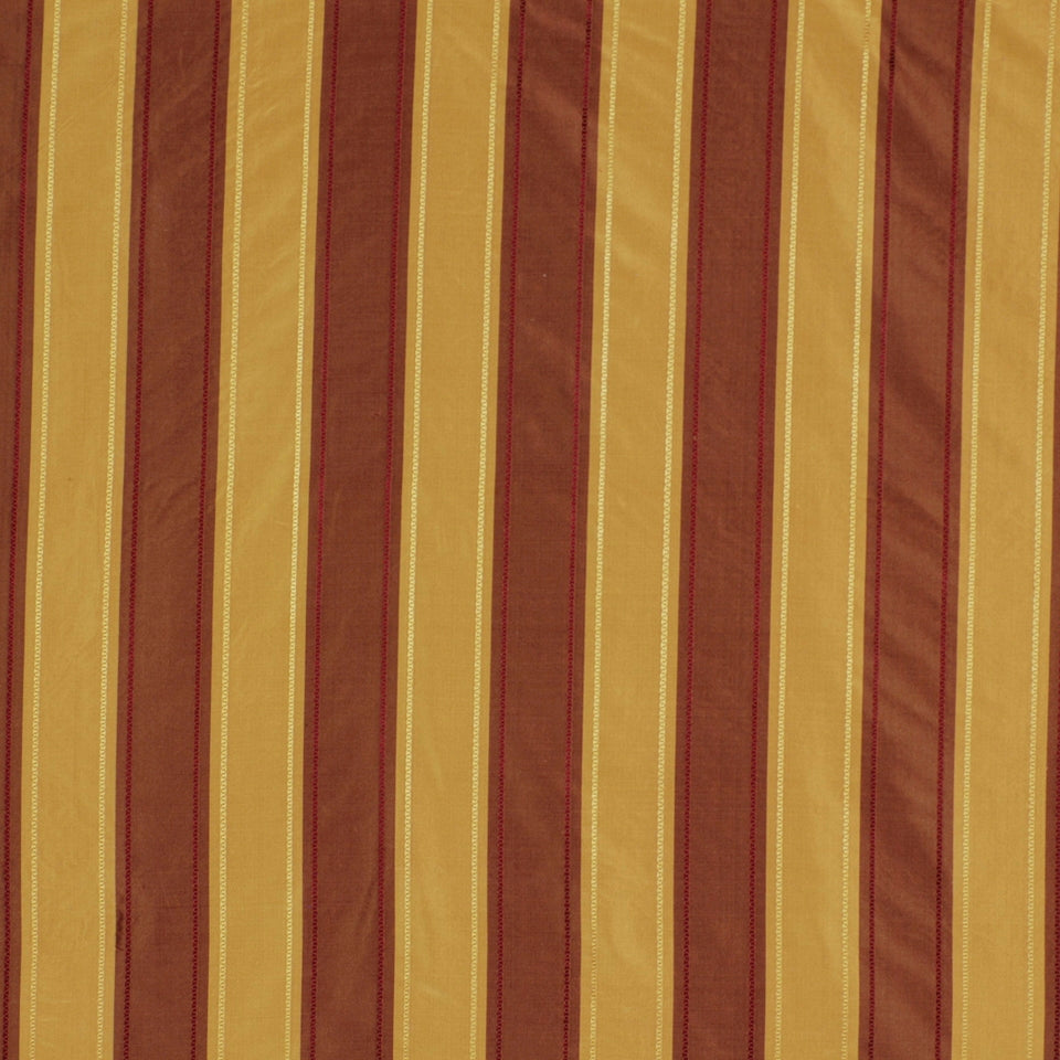 Mustard yellow & brown striped fabric with vertical bold stripes; woven texture, ideal for upholstery or curtains.