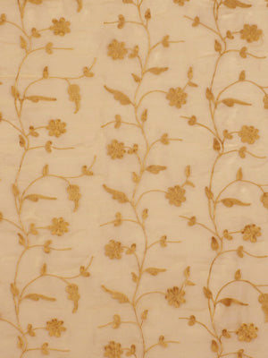 Beige fabric with gold floral vine pattern and small blossoms