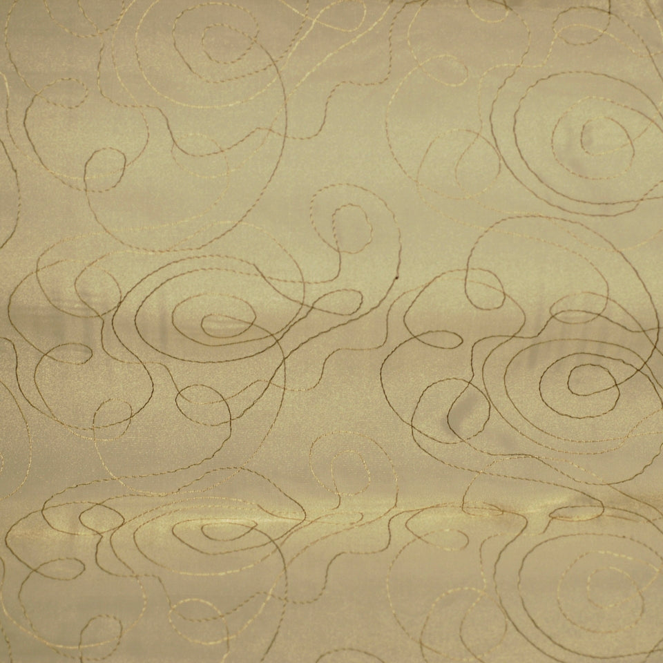 Beige satin fabric with gold thread swirling embroidery; abstract scroll pattern, suitable for drapery and home decor.