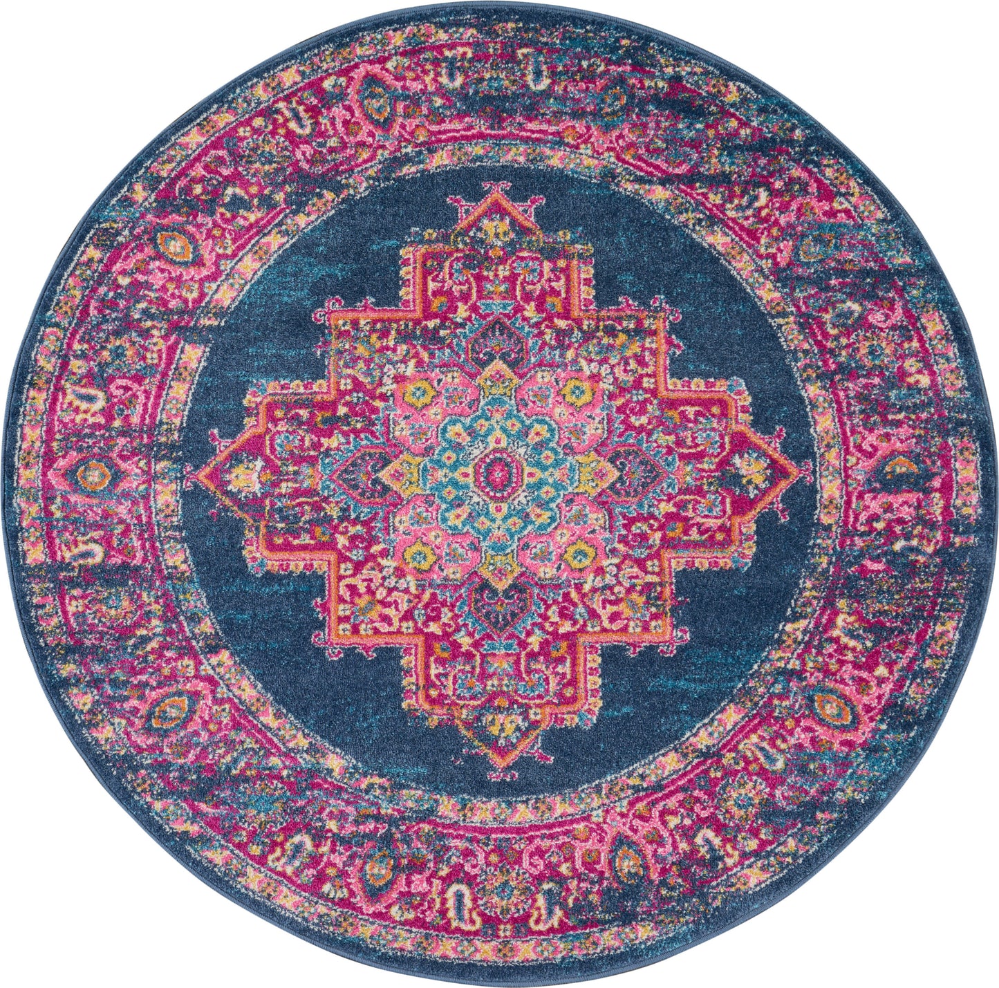 Round boho rug with vibrant teal, pink, and yellow mandala pattern on navy background.