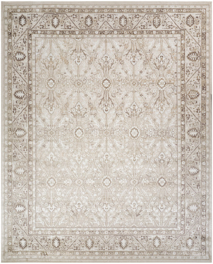 Cream-beige Persian-style area rug with intricate floral medallion pattern and bordered frame; vintage distressed look.