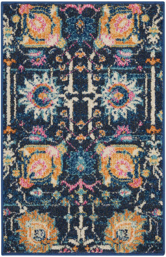 Rectangular oriental rug with dark navy ground, vivid orange, teal, pink florals and cream accents; plush textured pile.
