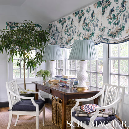 Emerald and peacock prints as wall art.