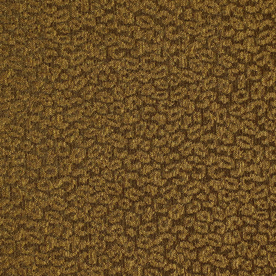 Golden-brown textured boucle fabric close-up with small irregular loops.