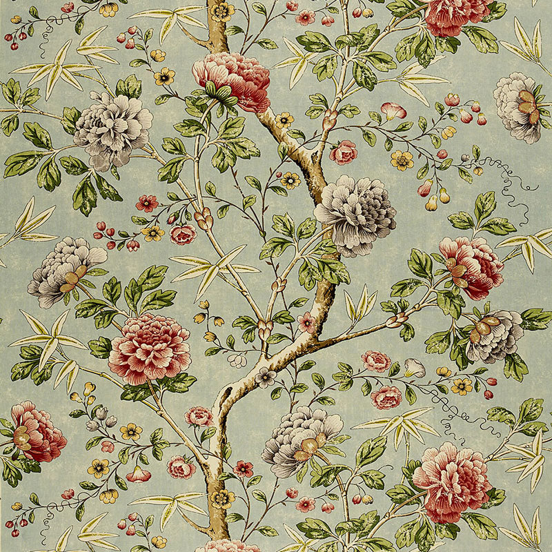 Chinoiserie-style fabric: pink and cream peonies, bamboo stalks, green leaves on pale blue background.
