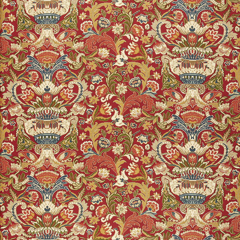 Elegant red damask upholstery fabric with ornate floral urn motifs, gold and blue accents.