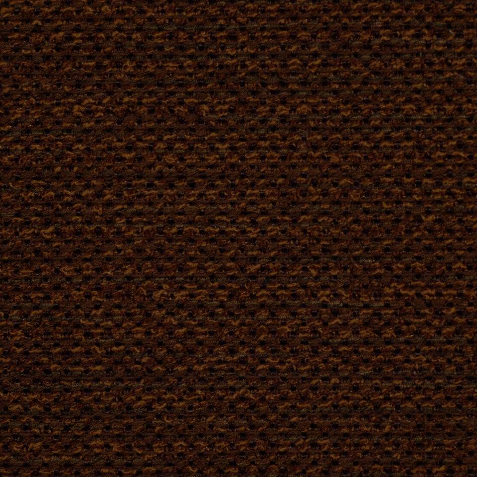Dark brown waffle-knit upholstery fabric texture with tiny raised dots.
