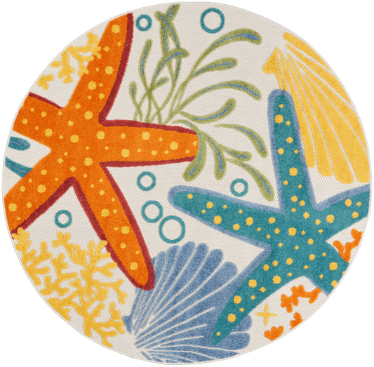 Round coastal rug featuring orange and teal starfish, yellow coral, seaweed and shells.