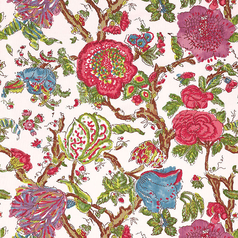 Bright azalea floral print on fabric with pink, red, blue flowers, green leaves and brown branches on a cream background.