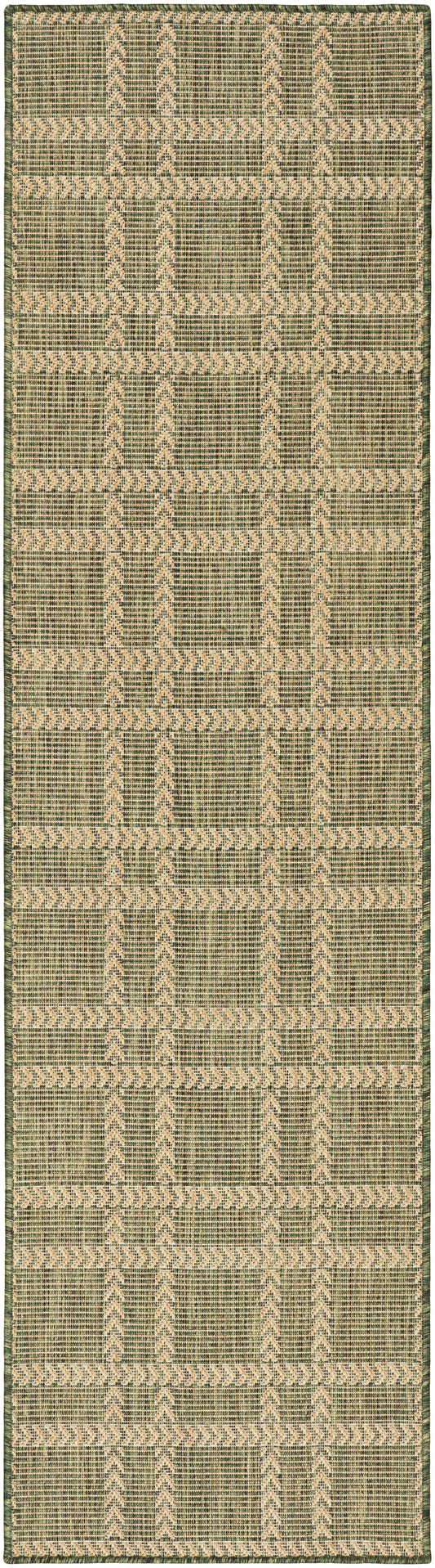 Olive-green woven area rug with beige geometric chevron pattern; natural, earthy texture.
