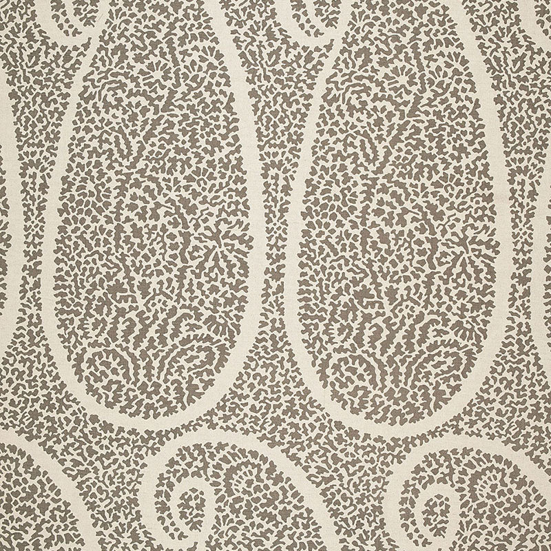 Beige wallpaper with taupe speckled paisley motifs in a repeating, elegant pattern.
