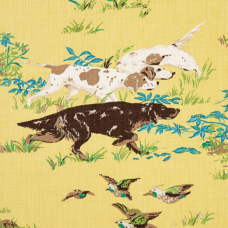 Yellow linen-style fabric print with a brown running dog, two white-brown dogs, green-blue foliage, and flying birds.