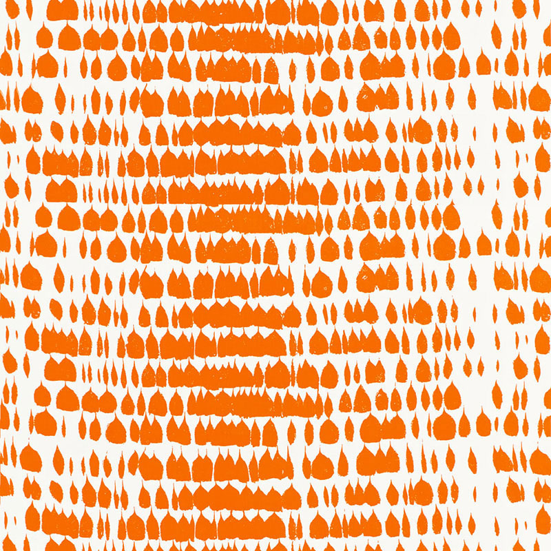 Orange teardrop shapes repeating across a white background; bold geometric textile print.