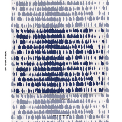 Folded white fabric with dense navy teardrop print; modern abstract textile/scarf in blue tones.