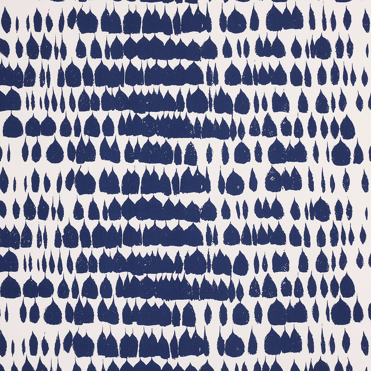 Dark navy teardrop shapes arranged in a dense repeating grid against a white backdrop; decorative textile print.