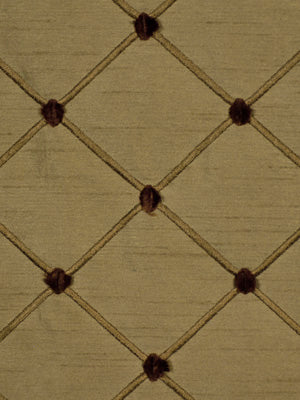 Saddle beige fabric with a quilted dotted pattern and knot-like intersections.
