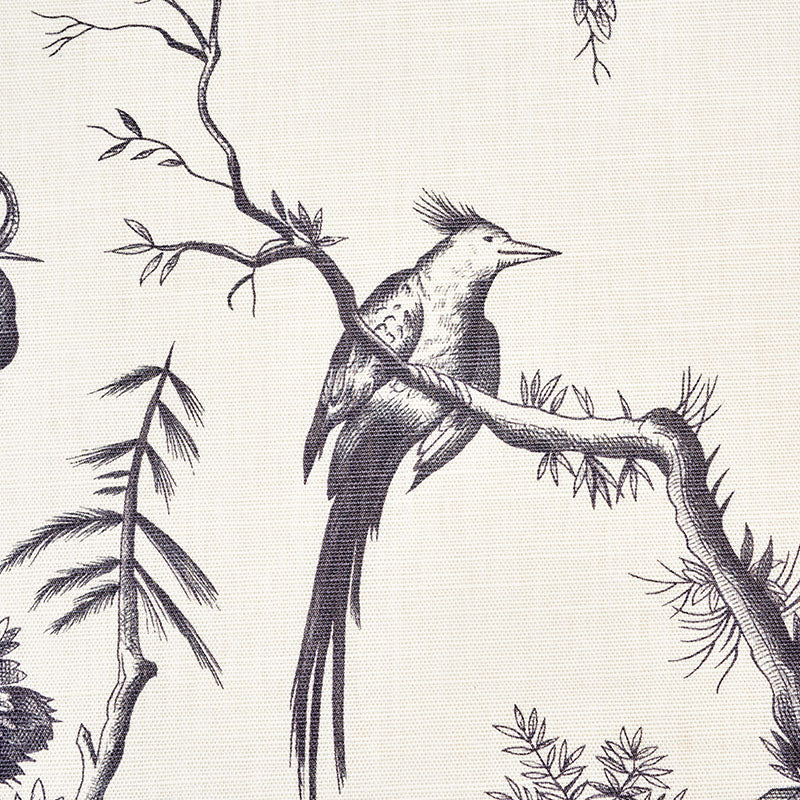 Cream toile-style print featuring a black ink bird perched on a leafy branch.