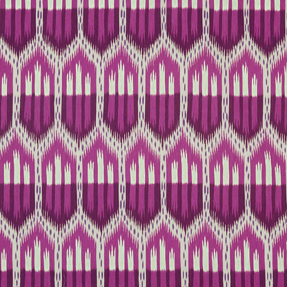 Purple and white ikat-style geometric textile with repeating diamond motifs.