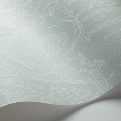 Mint green wallpaper with delicate white dragon & cloud motifs; curling corner reveals smooth paper texture.