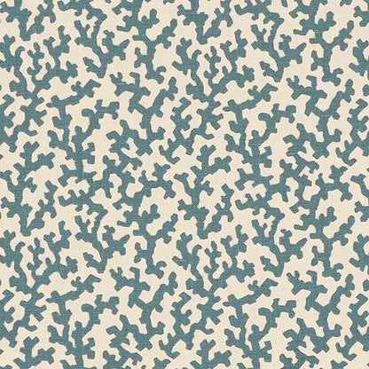 Teal coral-like branch pattern on cream background; repeating organic print for fabric or wallpaper.